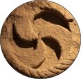 Triskel espiral grabado en piedra.